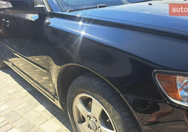 Черный Вольво В50, объемом двигателя 1.56 л и пробегом 237 тыс. км за 7000 $, фото 2 на Automoto.ua