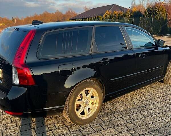 Черный Вольво В50, объемом двигателя 1.6 л и пробегом 252 тыс. км за 6950 $, фото 11 на Automoto.ua