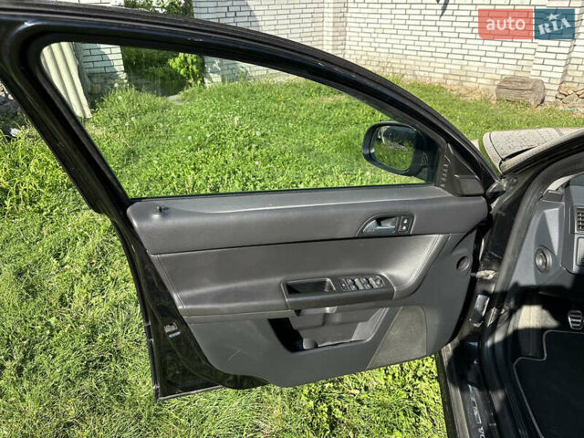 Черный Вольво В50, объемом двигателя 1.98 л и пробегом 265 тыс. км за 8000 $, фото 52 на Automoto.ua