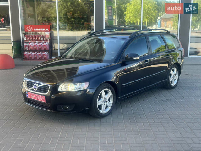 Черный Вольво В50, объемом двигателя 1.6 л и пробегом 258 тыс. км за 7750 $, фото 1 на Automoto.ua