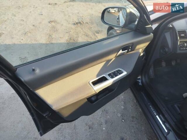 Черный Вольво В50, объемом двигателя 1.6 л и пробегом 208 тыс. км за 7200 $, фото 19 на Automoto.ua