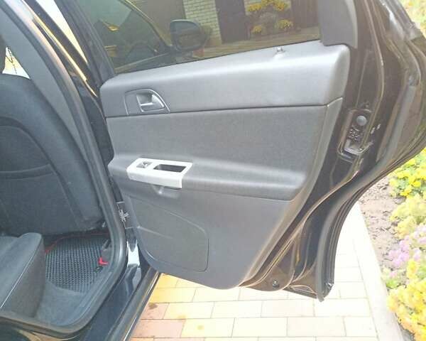 Чорний Вольво V50, об'ємом двигуна 1.6 л та пробігом 278 тис. км за 7600 $, фото 5 на Automoto.ua