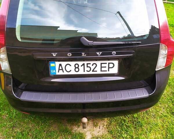 Черный Вольво В50, объемом двигателя 1.56 л и пробегом 265 тыс. км за 6900 $, фото 1 на Automoto.ua