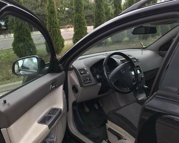 Черный Вольво В50, объемом двигателя 1.6 л и пробегом 243 тыс. км за 7200 $, фото 4 на Automoto.ua