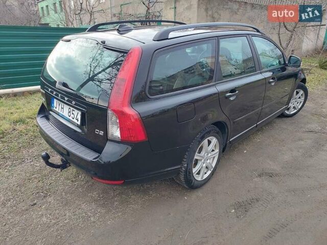 Чорний Вольво V50, об'ємом двигуна 1.6 л та пробігом 245 тис. км за 7500 $, фото 2 на Automoto.ua