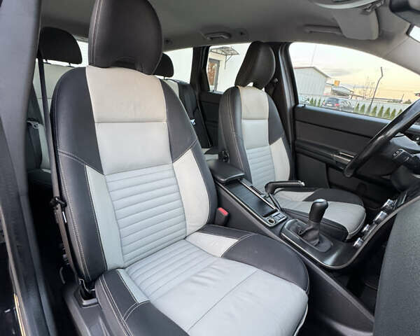 Черный Вольво В50, объемом двигателя 1.6 л и пробегом 235 тыс. км за 9350 $, фото 36 на Automoto.ua