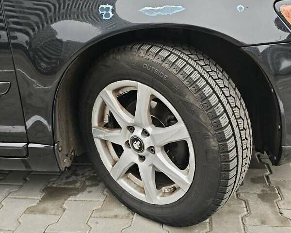 Чорний Вольво V50, об'ємом двигуна 1.56 л та пробігом 340 тис. км за 7000 $, фото 3 на Automoto.ua