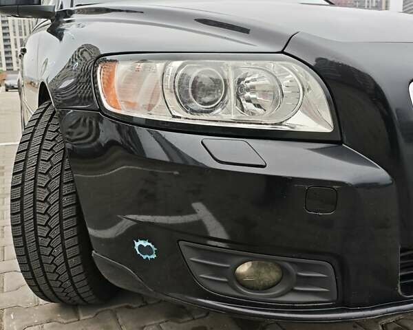 Чорний Вольво V50, об'ємом двигуна 1.56 л та пробігом 340 тис. км за 7000 $, фото 1 на Automoto.ua