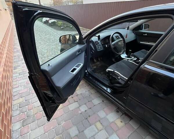 Черный Вольво В50, объемом двигателя 1.6 л и пробегом 261 тыс. км за 8200 $, фото 11 на Automoto.ua