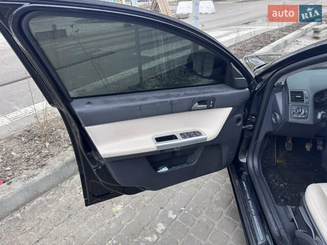 Черный Вольво В50, объемом двигателя 1.56 л и пробегом 237 тыс. км за 7600 $, фото 14 на Automoto.ua