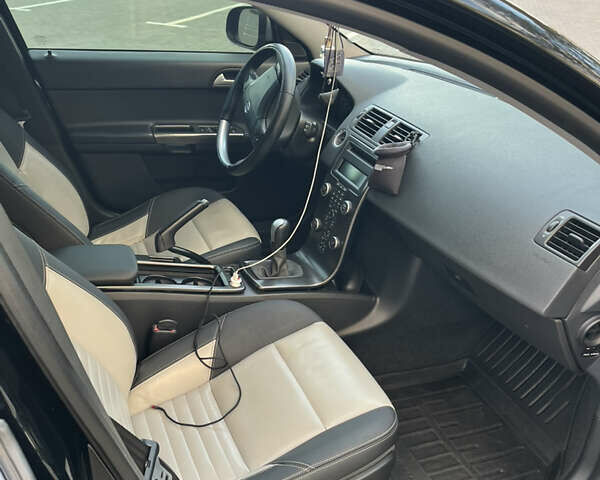 Черный Вольво В50, объемом двигателя 1.56 л и пробегом 264 тыс. км за 8300 $, фото 11 на Automoto.ua