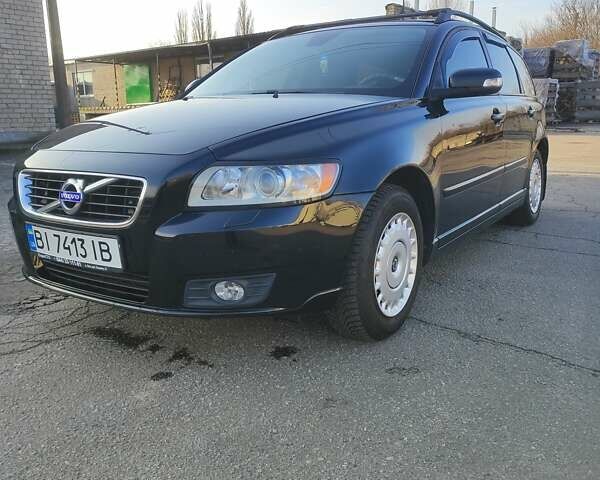 Черный Вольво В50, объемом двигателя 1.6 л и пробегом 201 тыс. км за 7500 $, фото 1 на Automoto.ua