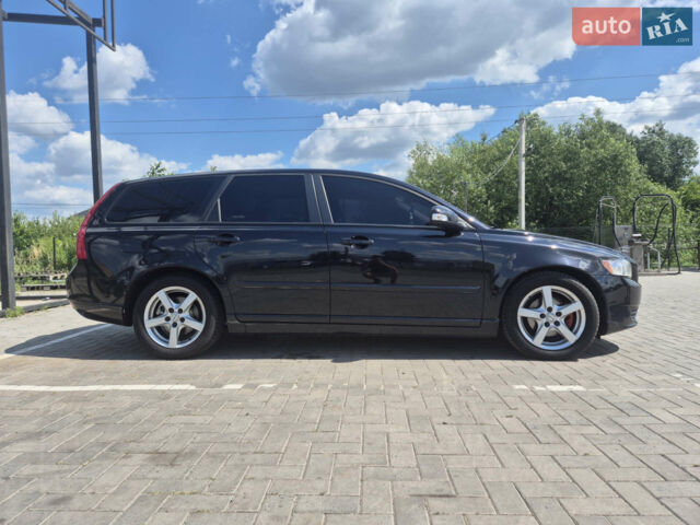 Черный Вольво В50, объемом двигателя 1.56 л и пробегом 250 тыс. км за 7000 $, фото 1 на Automoto.ua