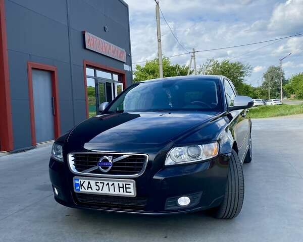 Черный Вольво В50, объемом двигателя 1.98 л и пробегом 187 тыс. км за 9400 $, фото 2 на Automoto.ua