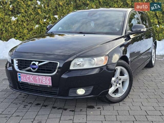 Черный Вольво В50, объемом двигателя 1.6 л и пробегом 192 тыс. км за 8599 $, фото 2 на Automoto.ua