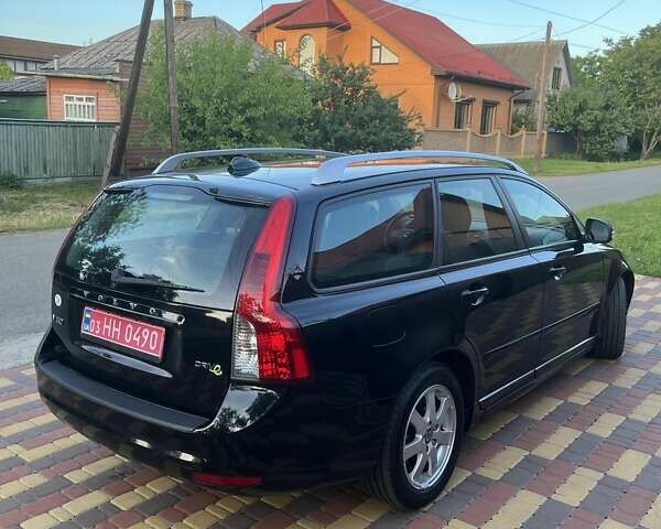 Черный Вольво В50, объемом двигателя 1.6 л и пробегом 237 тыс. км за 9100 $, фото 2 на Automoto.ua