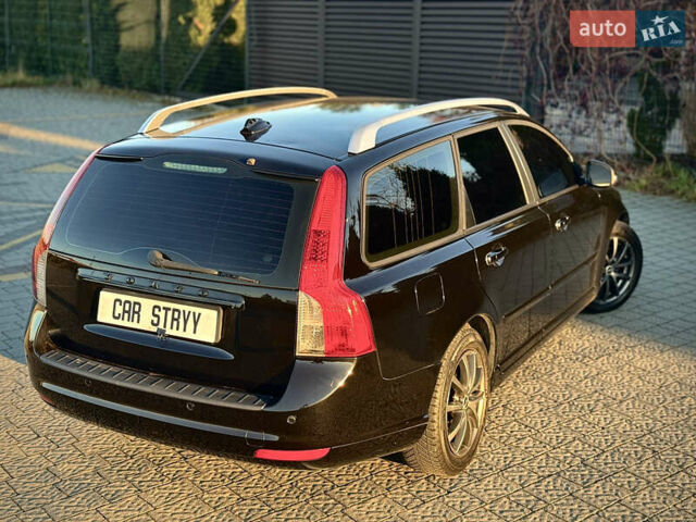 Черный Вольво В50, объемом двигателя 1.6 л и пробегом 259 тыс. км за 7800 $, фото 16 на Automoto.ua