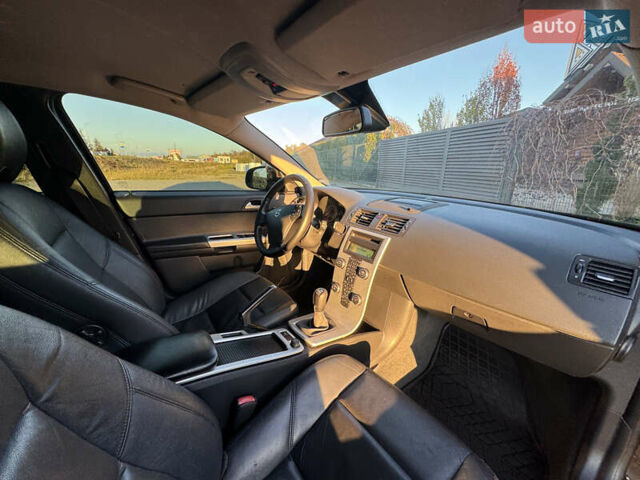 Черный Вольво В50, объемом двигателя 1.6 л и пробегом 259 тыс. км за 7800 $, фото 28 на Automoto.ua