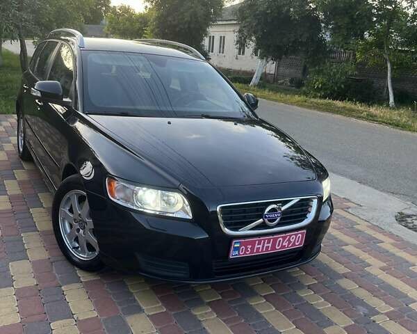 Чорний Вольво V50, об'ємом двигуна 1.6 л та пробігом 236 тис. км за 9100 $, фото 2 на Automoto.ua
