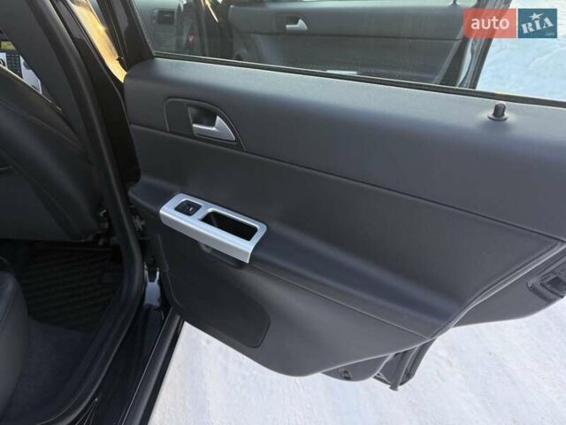 Чорний Вольво V50, об'ємом двигуна 2 л та пробігом 160 тис. км за 10650 $, фото 37 на Automoto.ua