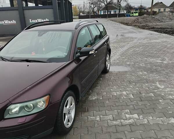 Червоний Вольво V50, об'ємом двигуна 2 л та пробігом 250 тис. км за 3350 $, фото 2 на Automoto.ua