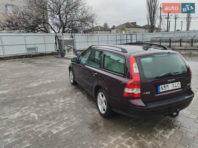 Червоний Вольво V50, об'ємом двигуна 2 л та пробігом 250 тис. км за 3350 $, фото 5 на Automoto.ua