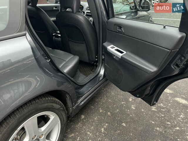 Серый Вольво В50, объемом двигателя 2 л и пробегом 205 тыс. км за 9200 $, фото 75 на Automoto.ua