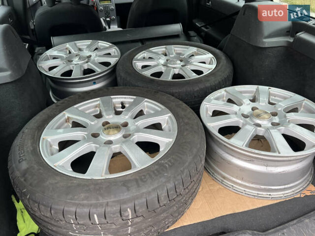 Серый Вольво В50, объемом двигателя 2 л и пробегом 250 тыс. км за 9350 $, фото 45 на Automoto.ua