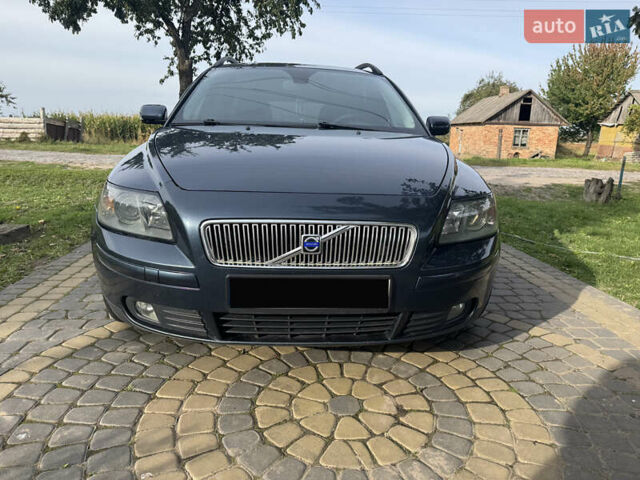 Синий Вольво В50, объемом двигателя 2 л и пробегом 285 тыс. км за 5300 $, фото 2 на Automoto.ua