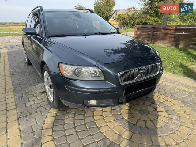 Синий Вольво В50, объемом двигателя 2 л и пробегом 285 тыс. км за 5300 $, фото 1 на Automoto.ua