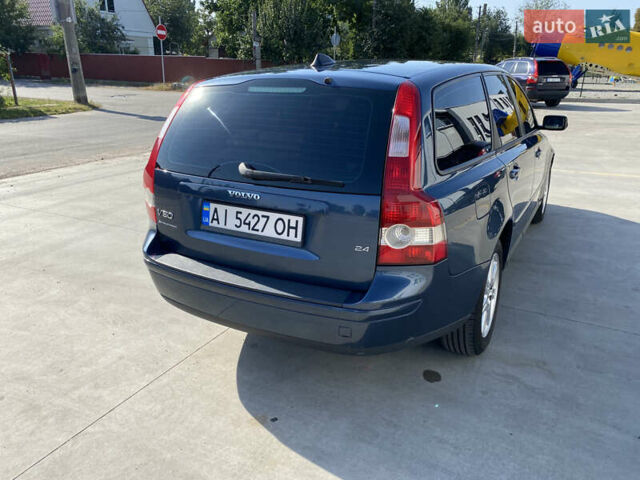 Синий Вольво В50, объемом двигателя 2.4 л и пробегом 320 тыс. км за 6700 $, фото 7 на Automoto.ua