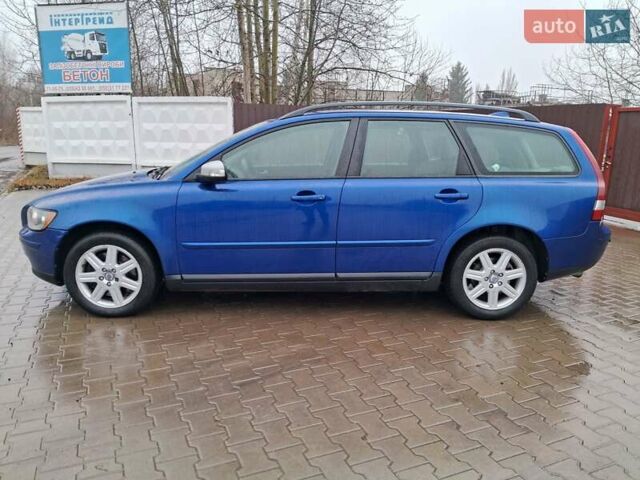 Синий Вольво В50, объемом двигателя 2.4 л и пробегом 283 тыс. км за 8700 $, фото 5 на Automoto.ua