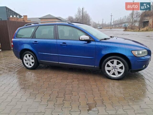 Синий Вольво В50, объемом двигателя 2.4 л и пробегом 283 тыс. км за 8700 $, фото 10 на Automoto.ua