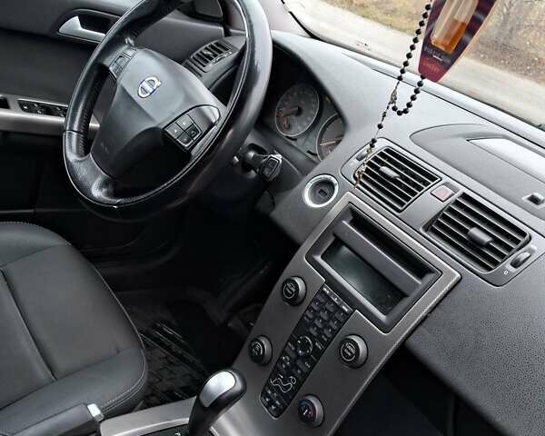 Синий Вольво В50, объемом двигателя 2.4 л и пробегом 283 тыс. км за 8700 $, фото 26 на Automoto.ua