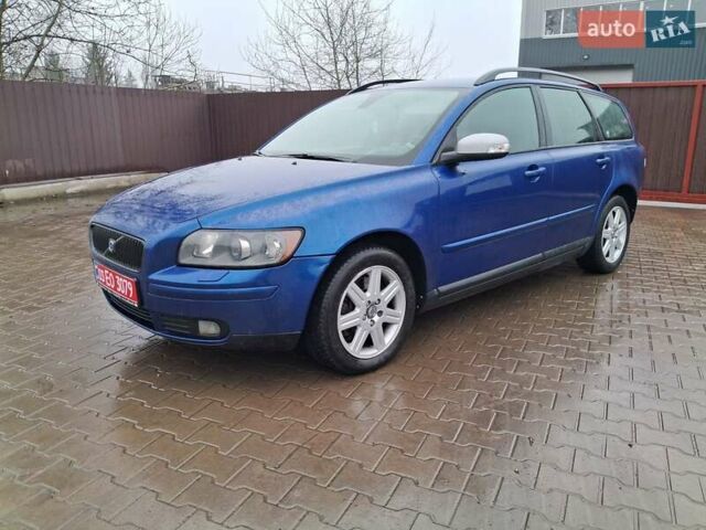 Синий Вольво В50, объемом двигателя 2.4 л и пробегом 283 тыс. км за 8700 $, фото 17 на Automoto.ua