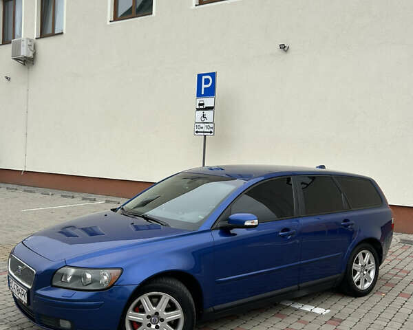 Синій Вольво V50, об'ємом двигуна 2 л та пробігом 344 тис. км за 7499 $, фото 5 на Automoto.ua