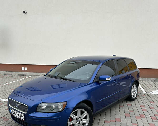 Синій Вольво V50, об'ємом двигуна 2 л та пробігом 344 тис. км за 7499 $, фото 2 на Automoto.ua