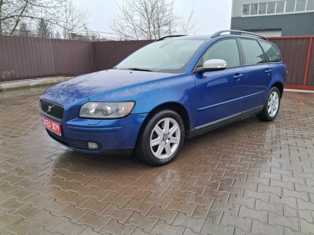 Синий Вольво В50, объемом двигателя 2.4 л и пробегом 283 тыс. км за 6950 $, фото 1 на Automoto.ua