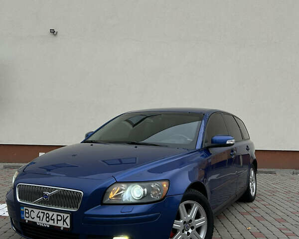 Синій Вольво V50, об'ємом двигуна 2 л та пробігом 344 тис. км за 7499 $, фото 1 на Automoto.ua