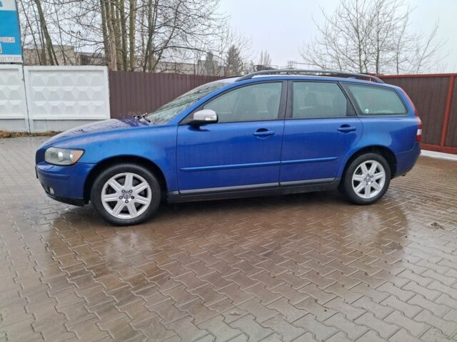 Синий Вольво В50, объемом двигателя 2.4 л и пробегом 283 тыс. км за 6950 $, фото 2 на Automoto.ua