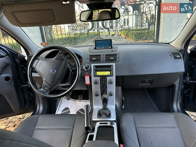 Синий Вольво В50, объемом двигателя 1.6 л и пробегом 234 тыс. км за 8300 $, фото 35 на Automoto.ua