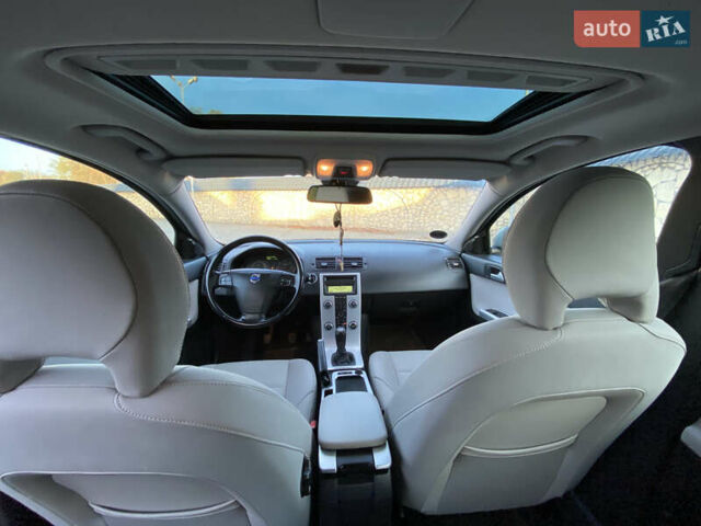 Синий Вольво В50, объемом двигателя 1.6 л и пробегом 212 тыс. км за 7200 $, фото 28 на Automoto.ua