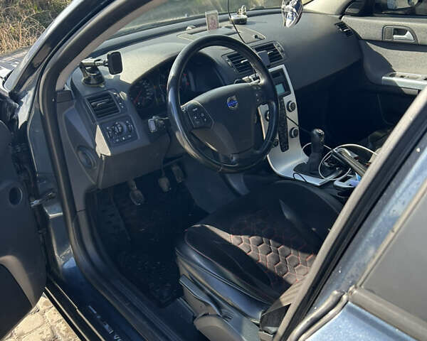 Синий Вольво В50, объемом двигателя 1.6 л и пробегом 229 тыс. км за 8700 $, фото 2 на Automoto.ua