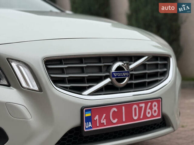 Белый Вольво B60, объемом двигателя 1.6 л и пробегом 218 тыс. км за 10700 $, фото 21 на Automoto.ua