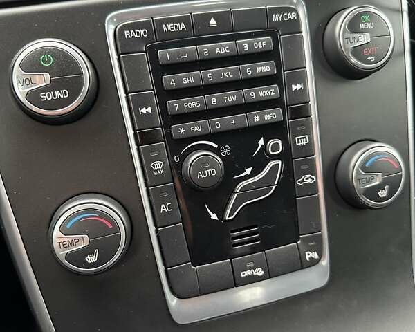 Бежевый Вольво B60, объемом двигателя 1.6 л и пробегом 215 тыс. км за 9700 $, фото 35 на Automoto.ua