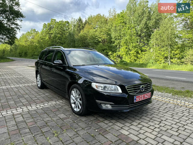 Чорний Вольво V70, об'ємом двигуна 2 л та пробігом 238 тис. км за 11777 $, фото 1 на Automoto.ua