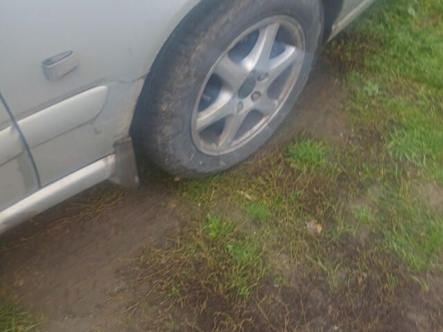 Серый Вольво В70, объемом двигателя 2.4 л и пробегом 350 тыс. км за 1350 $, фото 4 на Automoto.ua