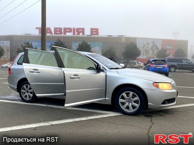 Сірий Вольво V70, об'ємом двигуна 2 л та пробігом 242 тис. км за 7600 $, фото 1 на Automoto.ua