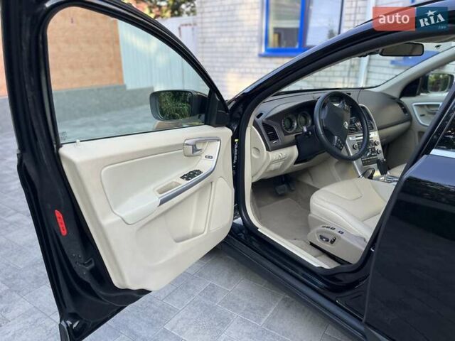 Чорний Вольво ХС60, об'ємом двигуна 2.4 л та пробігом 425 тис. км за 13000 $, фото 49 на Automoto.ua