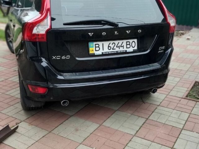 Черный Вольво ХС60, объемом двигателя 2.4 л и пробегом 102 тыс. км за 20000 $, фото 1 на Automoto.ua